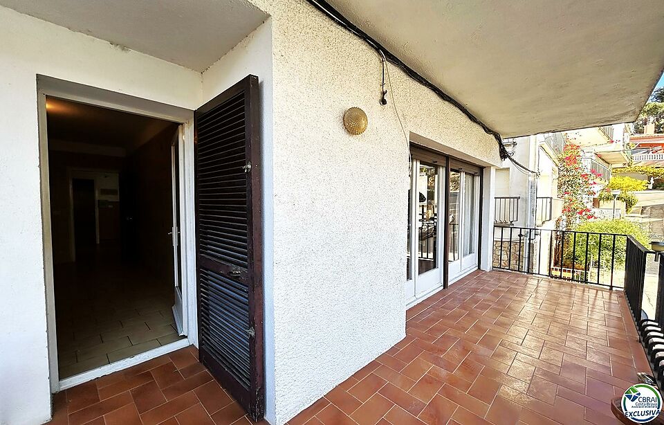 Flat situated in the centre of the village with large garage.